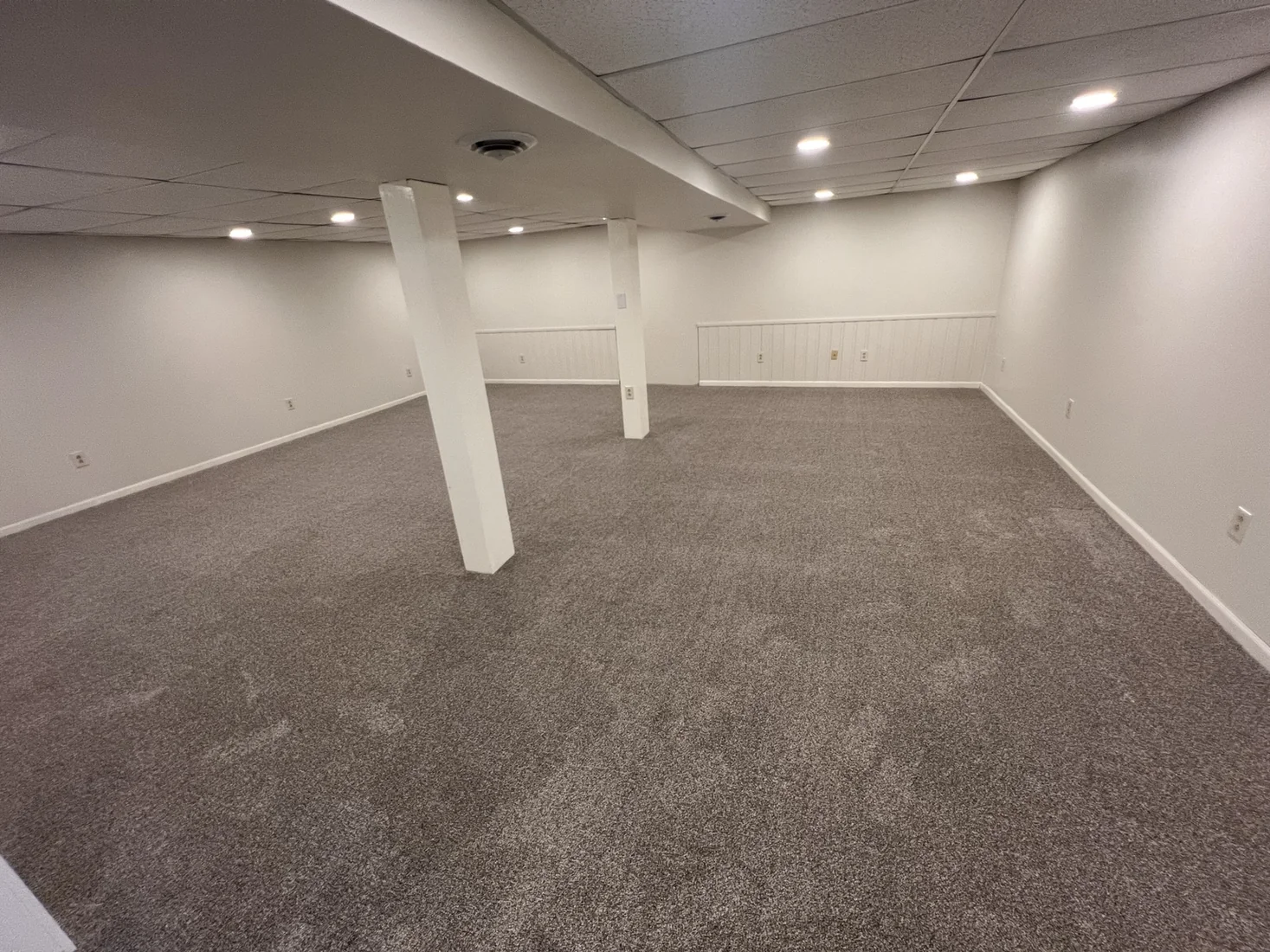 Premium gray carpet installation by PrimeLayer Pro